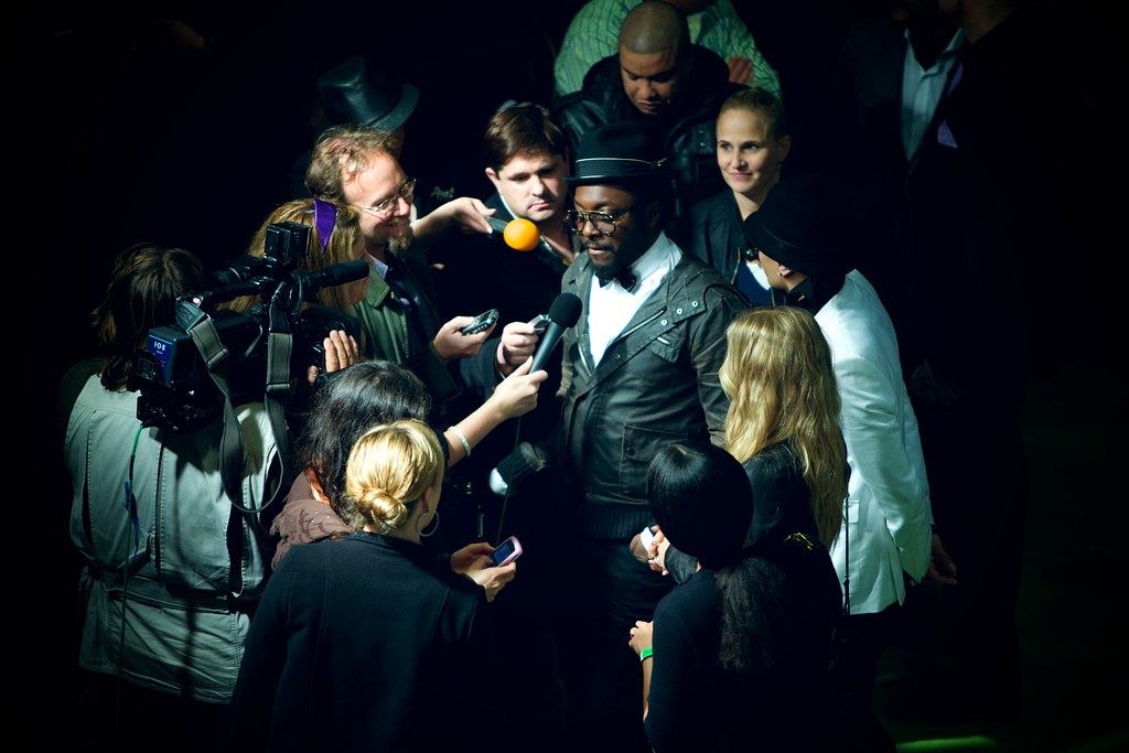 Image of interviewing some black man with glasses